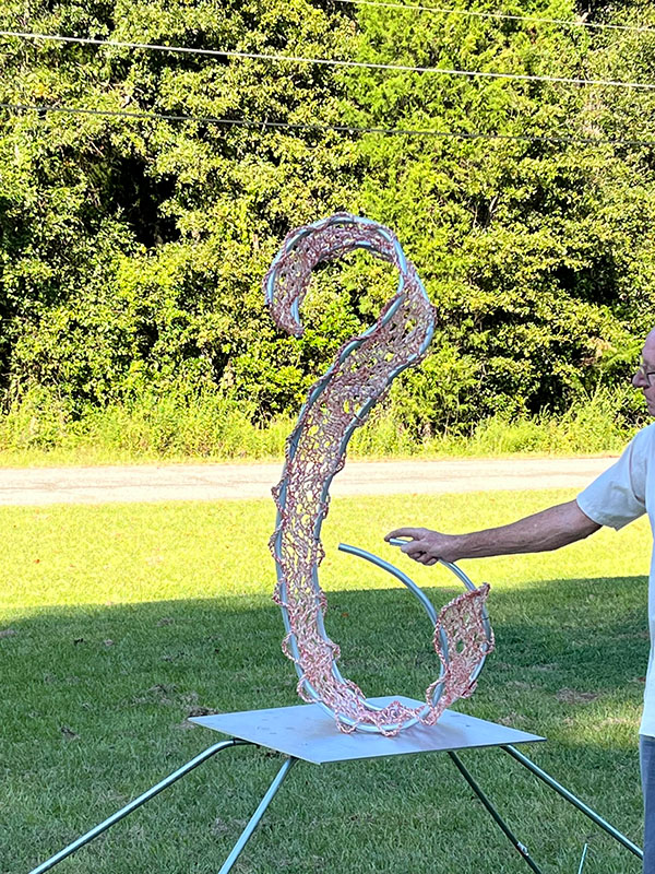 Testing the placement of the lace structure on the base. 